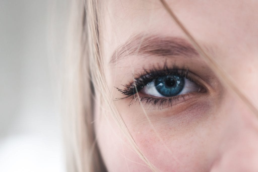Closeup of woman's shaped eyebrow