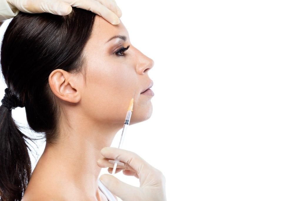 Woman receiving injectable wrinkle filler 