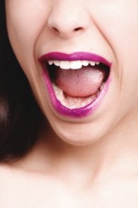 Closeup of enthusiastic woman's mouth